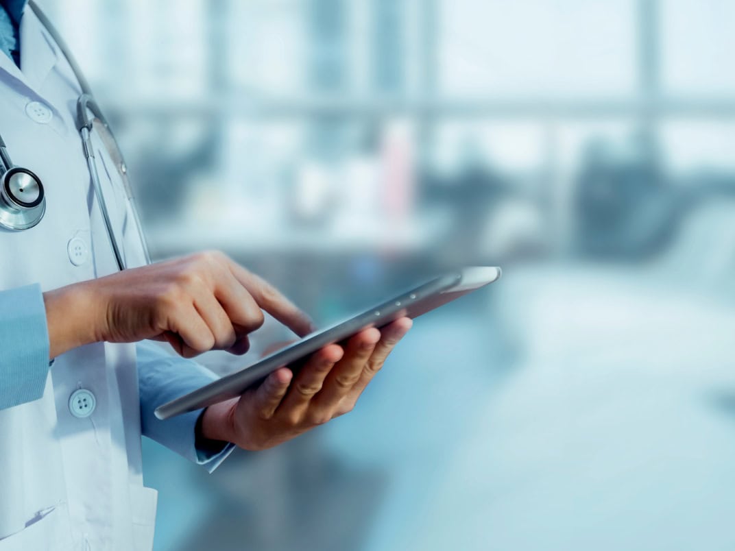 doctor-using-tablet doctor-using-tablet